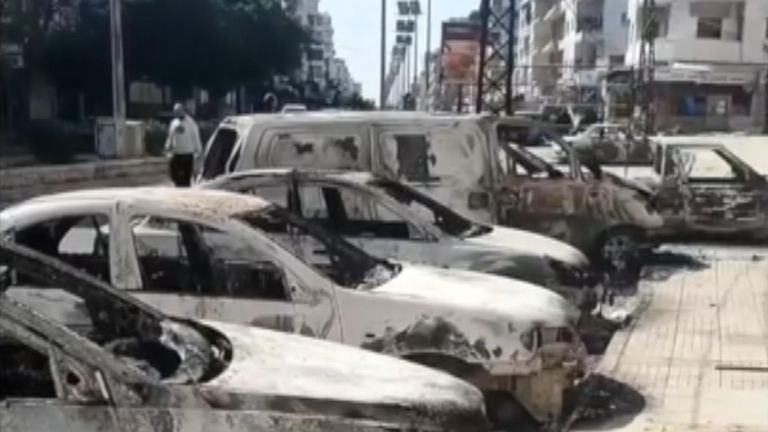 Burnt Cars, Damaged Stores, and Bodies Seen After Clashes in Syria&#39;s Jableh
